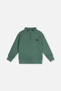 Deux par Deux dark green half-zip mock neck sweater laid flat, front view with a small deer on the chest