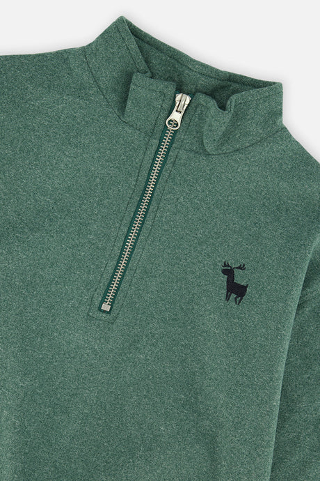Close-up of the half zip, mock neck and small deer on the dark green sweater