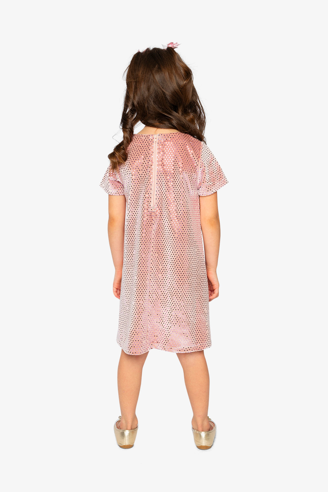 Child wearing the Deux par Deux dusty pink dotted velour dress, back view