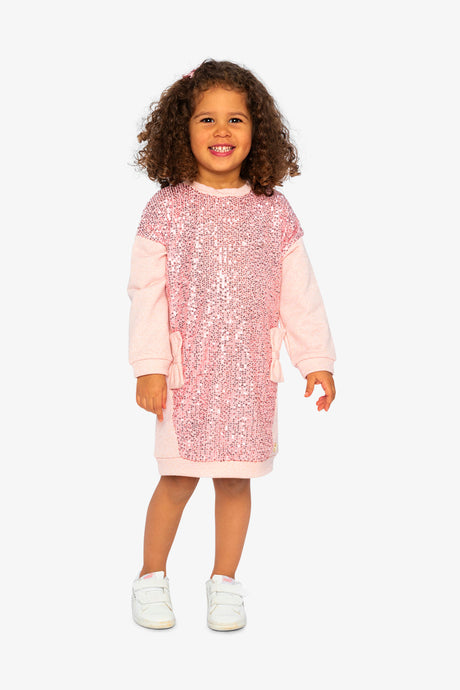 Child wearing the dusty pink sequin sweatshirt dress, front view