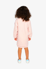 Child wearing the dusty pink sweatshirt dress, back view