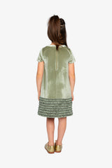Child wearing the Deux par Deux greyish green velour dress, back view