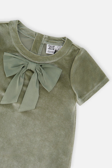 Close-up of the bow and velour neckline on the Deux par Deux greyish green dress