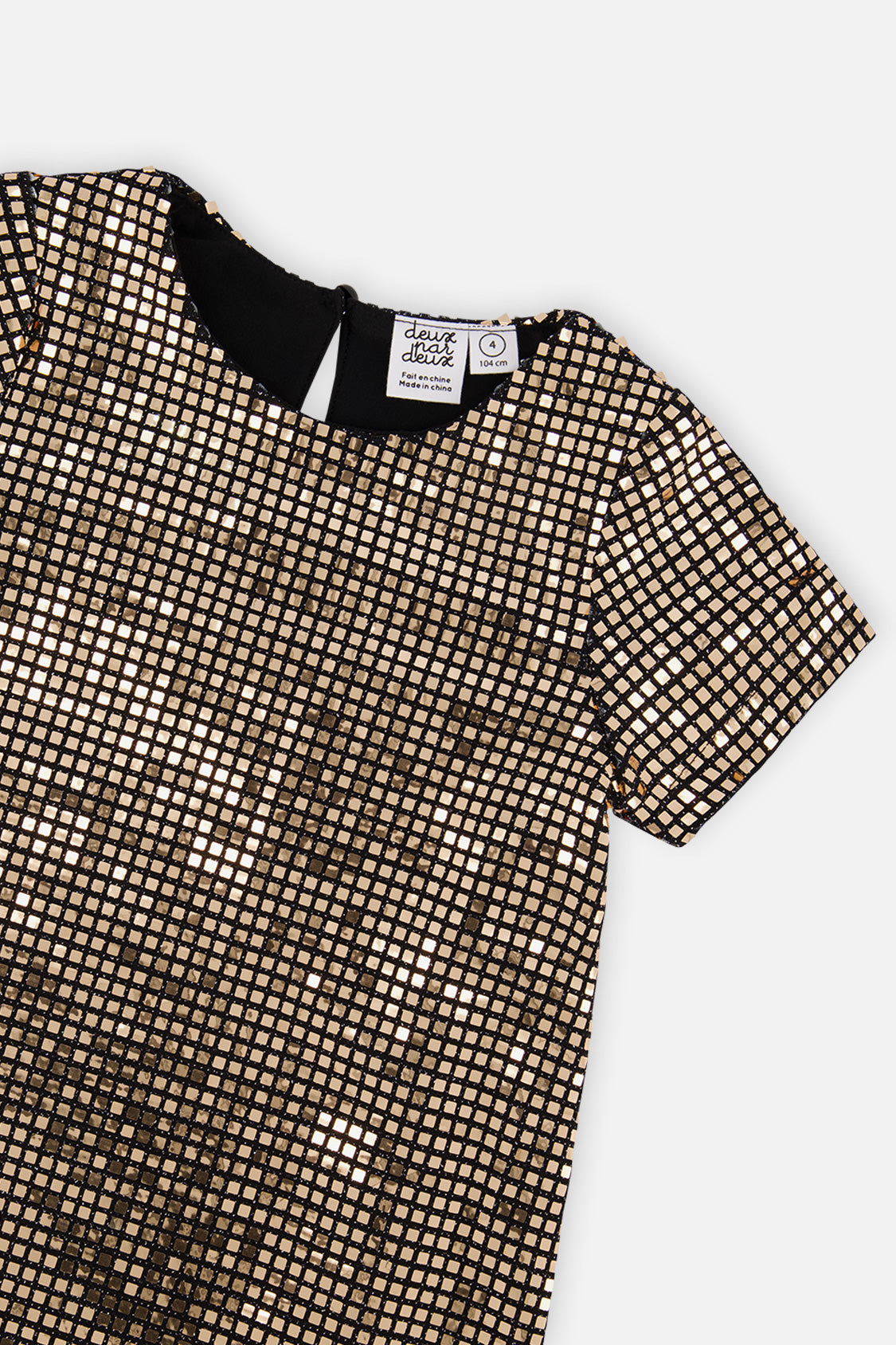 Close-up of the metallic square shimmer and neckline on the Deux par Deux bronze gold dress