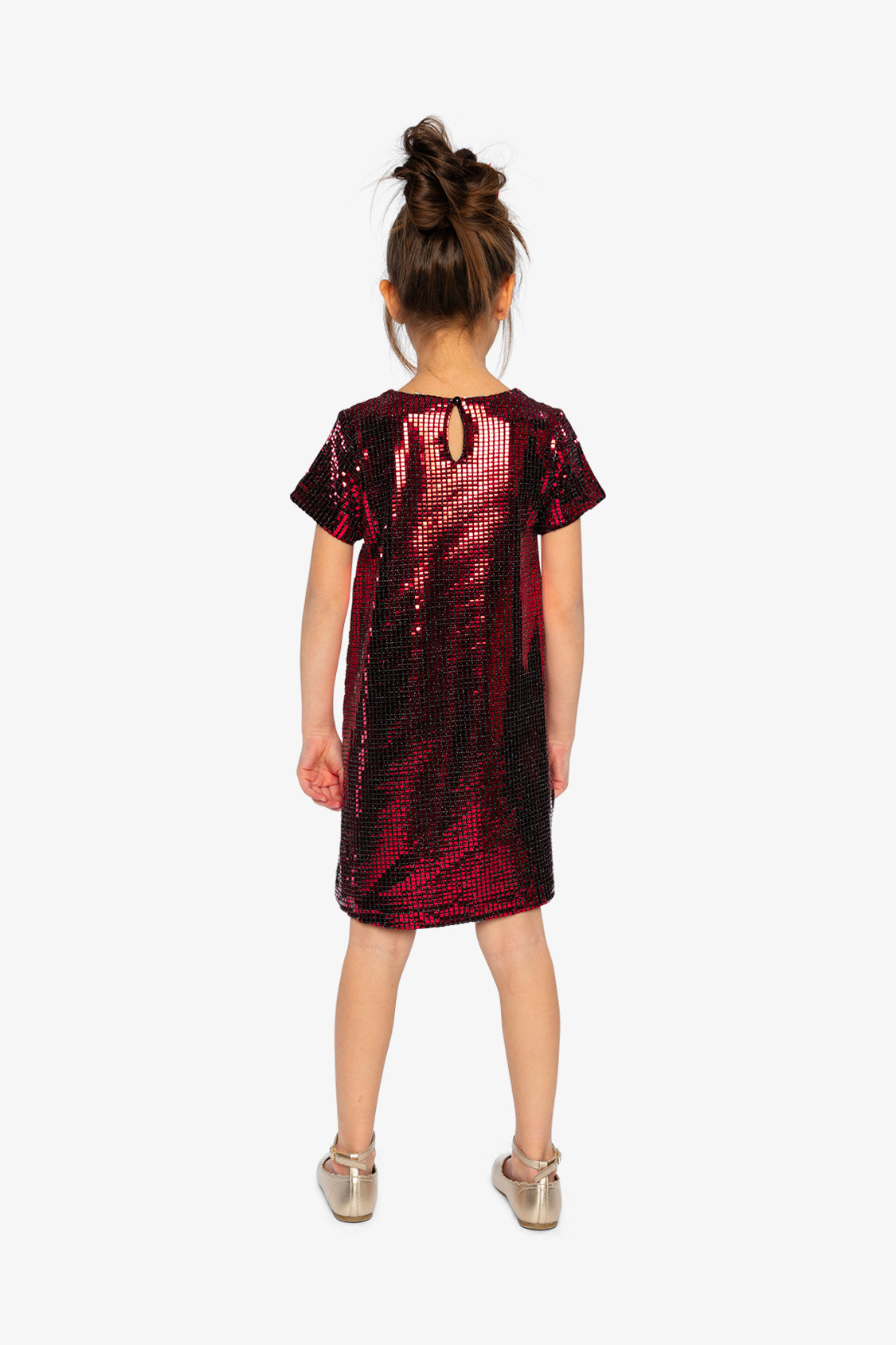 Child wearing the Deux par Deux red metallic A-line dress with a keyhole opening, back view