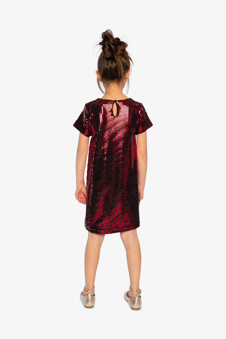 Child wearing the Deux par Deux red metallic A-line dress with a keyhole opening, back view