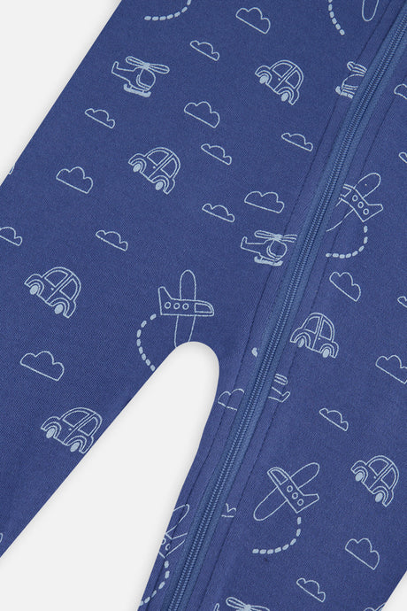 Close-up of the light blue outline cars, helicopters and planes printed on the blue pajama beside the zipper