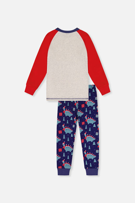 Back view of the blue dinosaur pajama set laid flat with a plain oatmeal back and red sleeves