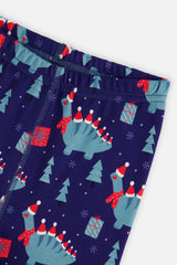 Close-up of the navy pants waist covered in dinosaurs and trees and gift boxes