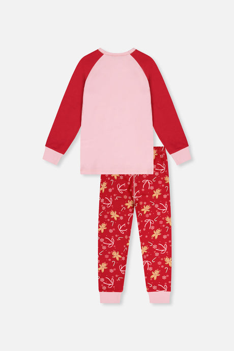 Back view of the red gingerbread pajama set laid flat with a plain pink back and red sleeves