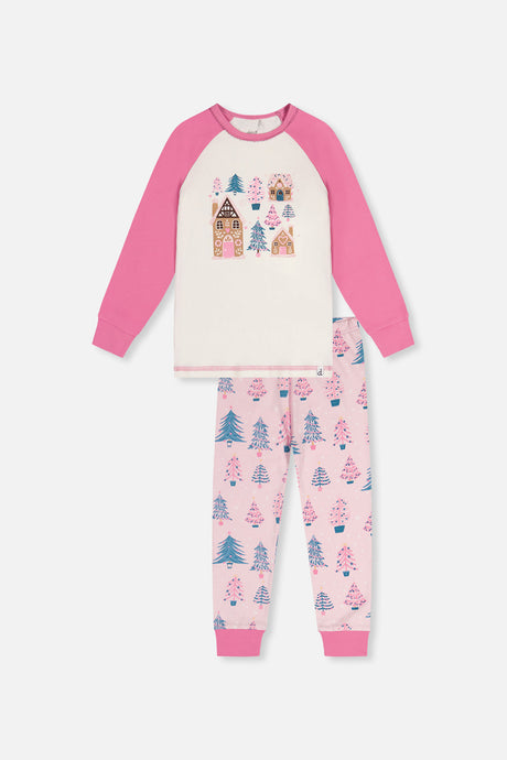 Pink tree print pajama set with a cream top, bright pink sleeves and a gingerbread house chest print, front view laid flat