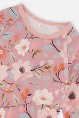 Close-up of the neckline and raglan sleeve on the pink floral sleepwear top
