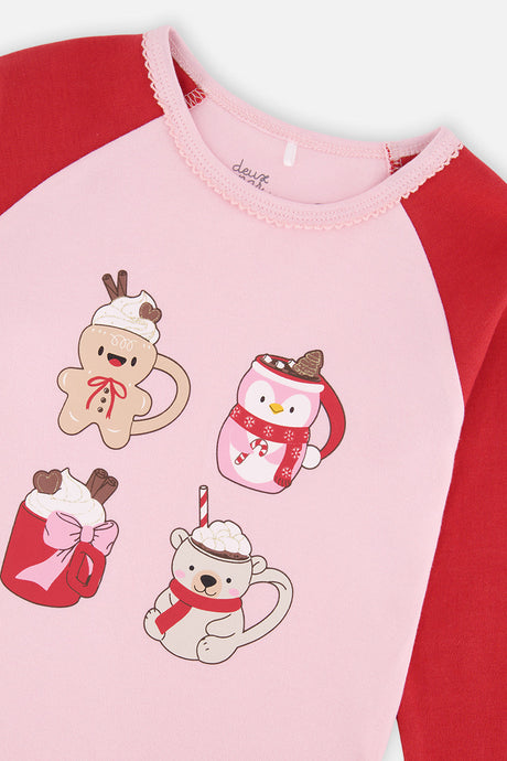 Close-up of the cocoa mug graphic on the pale pink pajama top