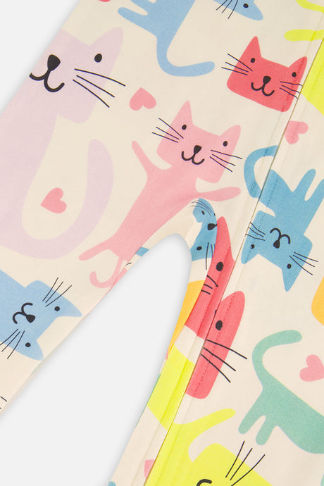 Close-up of the colorful cats and hearts on the white one piece pajama