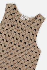 Close-up of the neckline and black bow and diamond print on the Deux par Deux jumper dress