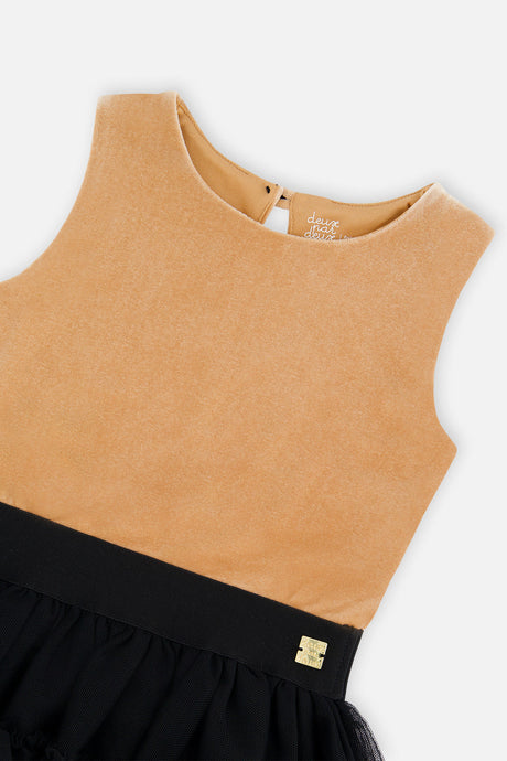 Close-up of the camel velour neckline and black waistband on the Deux par Deux party dress