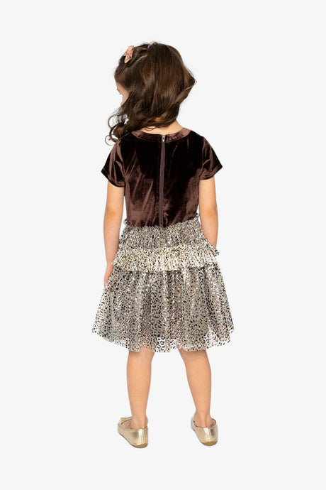 Child wearing the Deux par Deux brown velvet dress with a leopard print mesh skirt, back view