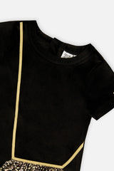 Close-up of the gold cord trim and neckline on the Deux par Deux black velour dress