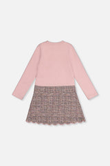 Back view of the pink and black knit dress with long sleeves