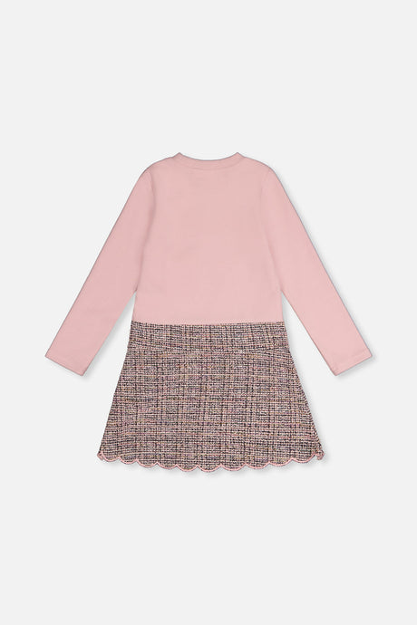 Back view of the pink and black knit dress with long sleeves