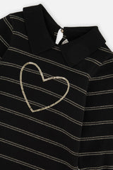 Close-up of the gold sequin heart, collar and gold stripes on the black knit