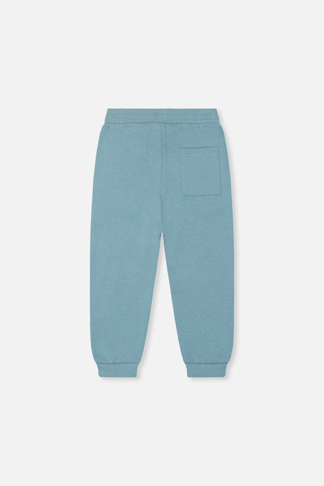 Deux par Deux pale turquoise fleece sweatpants, back view with a patch pocket and ribbed cuffs