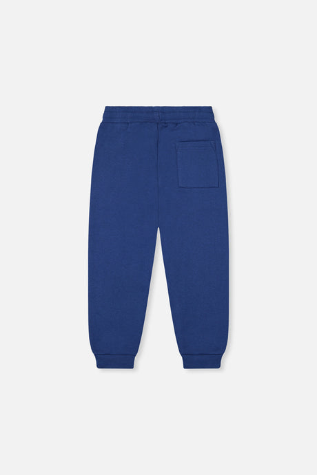 Deux par Deux blue fleece sweatpants, back view with a patch pocket and ribbed cuffs