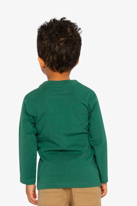Child wearing the green long-sleeve tee, back view