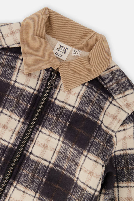 Close-up of the tan collar and the zipper on the navy and cream plaid Deux par Deux jacket