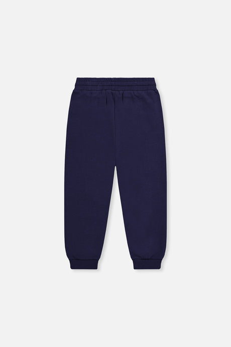 Deux par Deux dark blue fleece sweatpants, back view with ribbed ankle cuffs