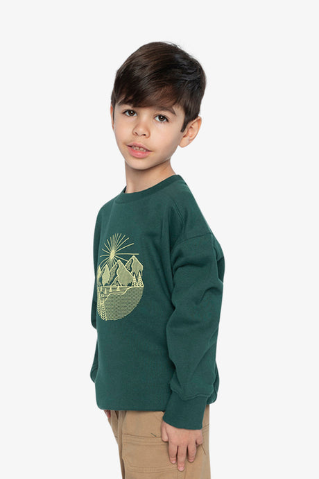 Child wearing the forest green fleece sweatshirt with khaki pants, side view