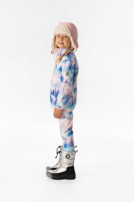 Child wearing the blue and pink mountain print fleece pullover, side view with sleeve label