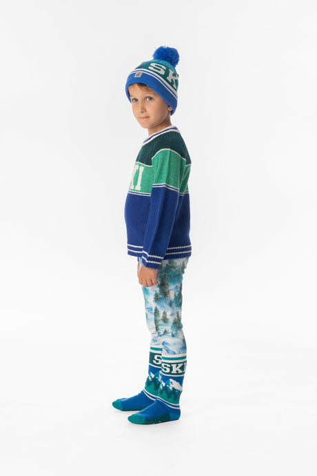 Child wearing the Deux par Deux SKI colorblock sweater, side view