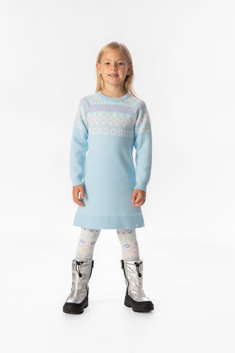 Child wearing the light blue Fair Isle knit dress, front view