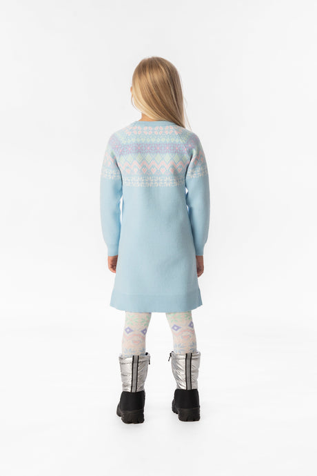 Child wearing the light blue Fair Isle knit dress, back view