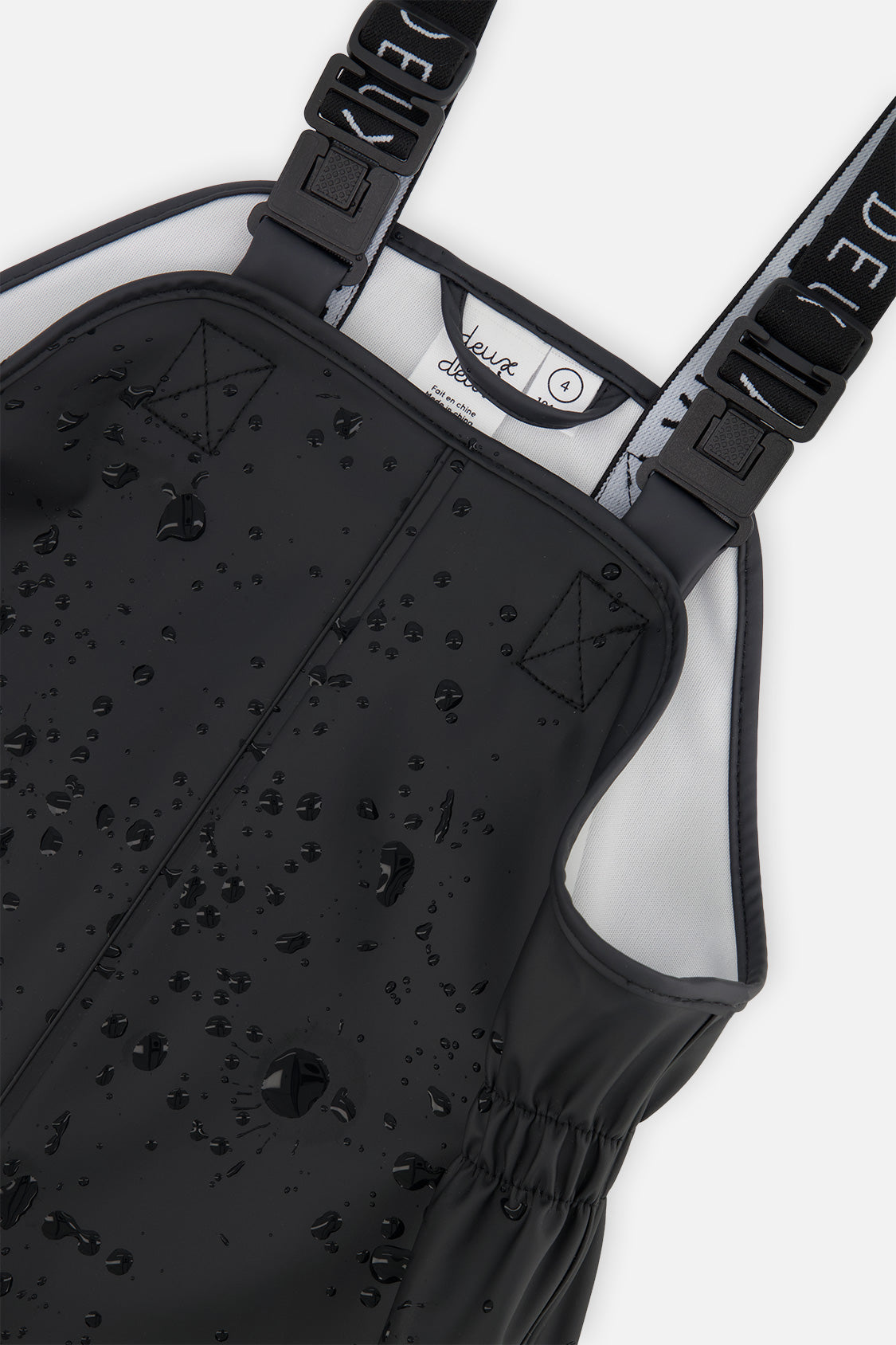 Deux par Deux black waterproof rain overalls, third alternate view