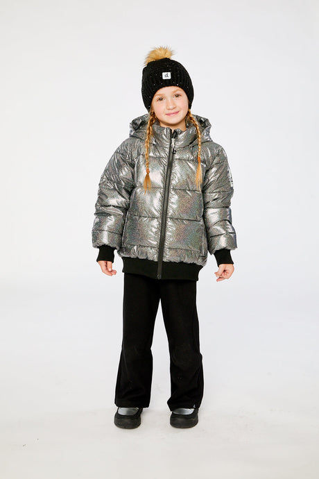 Child wearing the Deux par Deux dark metallic glitter puffy winter jacket with a pom-pom hat, front view