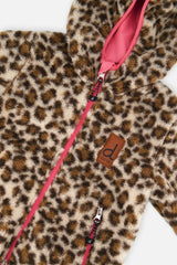 Close-up of the leopard sherpa print and front zip on the reversible jacket