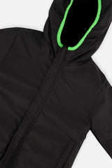 Close-up of the black coated side with a bright green hood trim and zipper