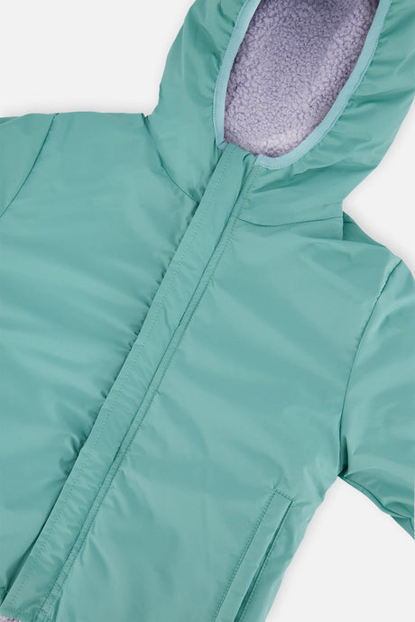 Close-up of the coated fabric side of the Deux par Deux reversible jacket