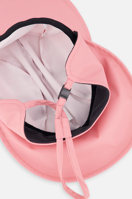 Underside of the pink baby rain hat showing the chin strap