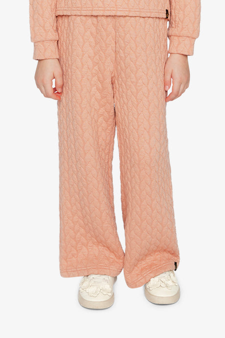 Child wearing the Wide Leg Jacquard Pants Pink, front view