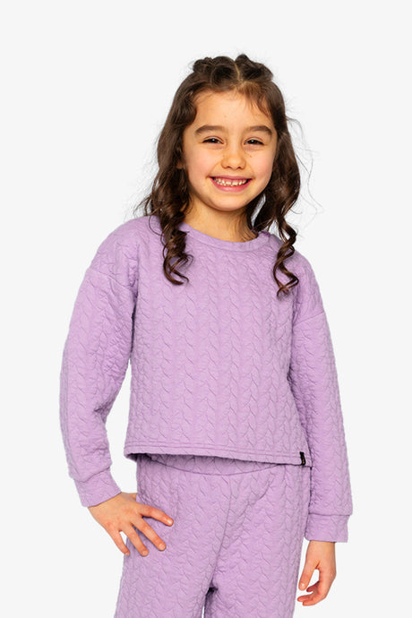 Child wearing the Jacquard Sweatshirt Purple, front view