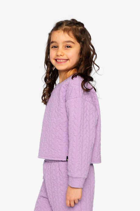 Child wearing the Jacquard Sweatshirt Purple, side view