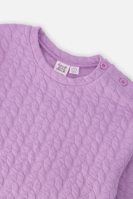 Close-up of the Jacquard Sweatshirt Purple neckline and shoulder buttons