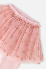 Close-up of the gathered waistband and bow print tulle skirt on the Deux par Deux dusty pink leggings