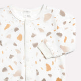 "golden pebble terrazzo" print on off-white sleeper | petit lem