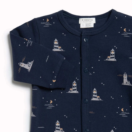 "lighthouse at night" print on anchor blue sleeper | petit lem