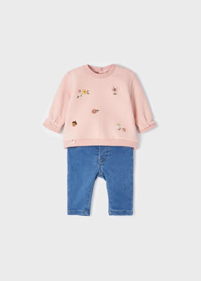 Front view of blush floral sweatshirt and blue baby jeggings set