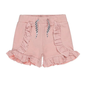 Front view of old pink Dirkje girls shorts with ruffles and patterned drawcord
